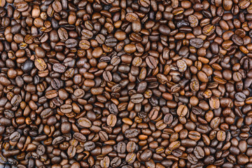 Top view of roasted coffee bean background.