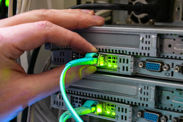 Servers and switches are located in the server room of the data center. Connecting the Internet...