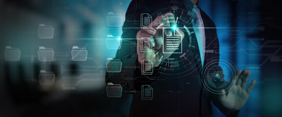 Businessman workimn Document Management System (DMS),Virtual online documentation database and...