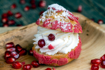 red cranberry-flavored cake with cranberry berries and creamy milk filling
