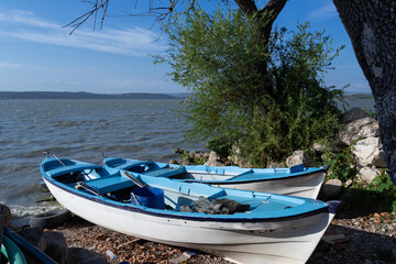 fishing boats by the lake