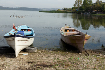 fishing boats by the lake