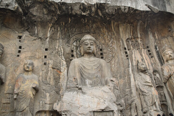 Buddha Statue Carving at Longmen Grottoes in Luoyang, Henan Province, China