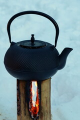 teapot on the fire Swedish torch, food in cauldron, campfire food, kettle on the fire