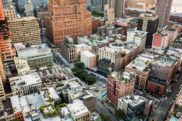 Aerial view of New York City above Finn Square and along West Broadway street, in Tribeca