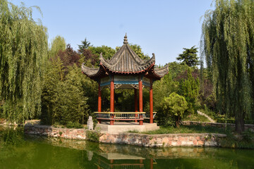 Traditional Chinese Pavilion in a park in Luoyang. Traditional Chinese garden. 