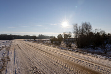 Obraz na płótnie Canvas dangerous road in winter after snowfall,