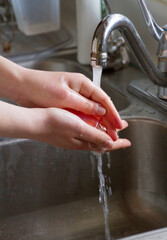 Washing Hands in a Sink