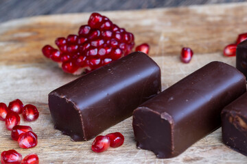 dessert of creamy filling and chocolate on a board