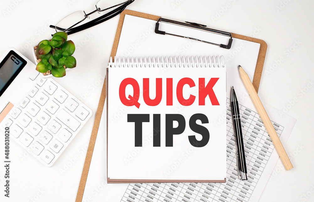 Aufkleber office desk table with paper sheet, notepad ,chart and calculator. top view quick tips
