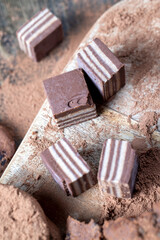 multi-layered sweets made of cream and chocolate layers