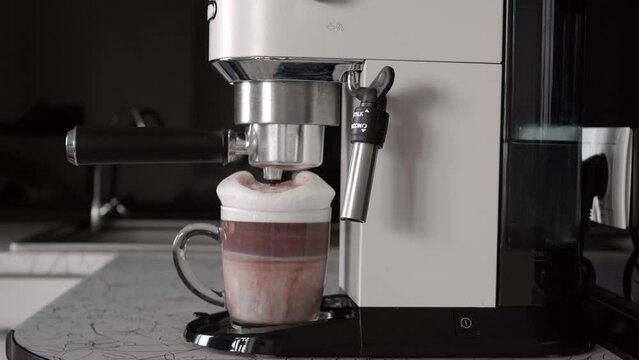 When something goes wrong. The coffee machine pours a mug of coffee. Failure in the kitchen.