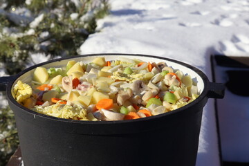 cauldron food winter stew with vegetables
