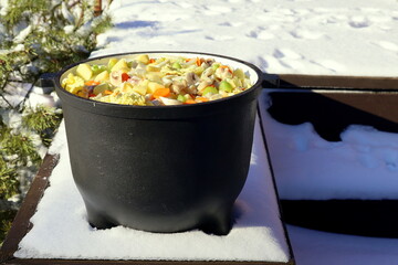 cauldron food winter stew with vegetables
