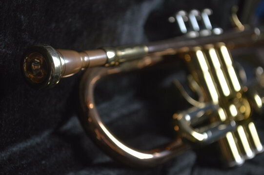 bronze trumpet musical instrument notes background