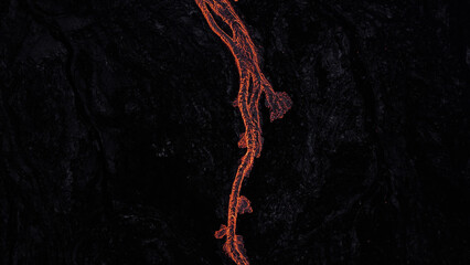 hot lava running on solidified black lava 