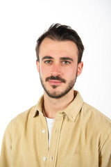 Obraz premium Close-up portrait of a dark boy with beard and hair isolated on white background