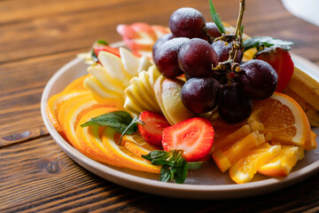 Plate with fresh fruits. Menu design concept.