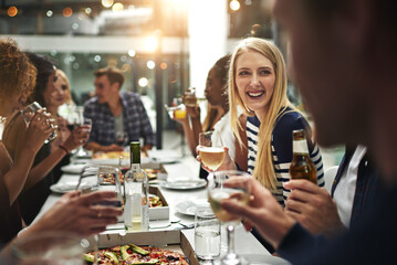 Good food, good friends, good times. Shot of friends having a dinner party at a restaurant.