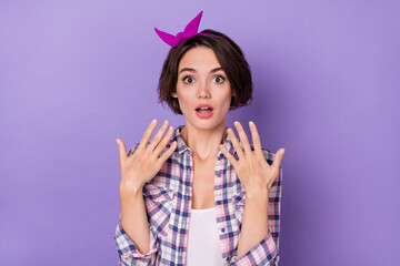 Photo of charming amazed lady with pink cute headband hear good unexpected news isolated on purple color background