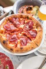 Delicious Italian Parma Ham and Pepperoni Pizza