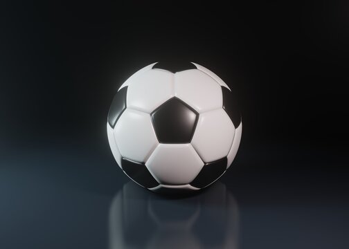 Soccer ball or football on a dark background with copy space in a conceptual image. 3d rendering illustration