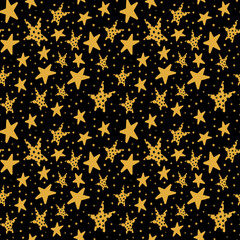 Seamless pattern with yellow stars on black background