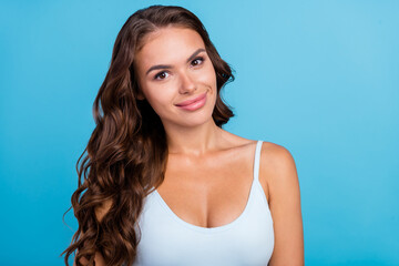 Photo of cool brunette hairstyle lady wear teal singlet isolated on blue color background