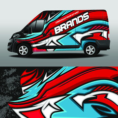 Delivery van vector design. Car sticker. Car design development for the company. Black background with red and blue abstract lines for car vinyl sticker

