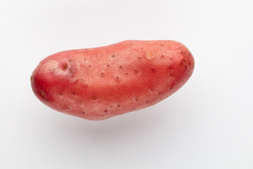 Red potato isolated on white background.