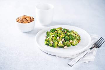Roasted Broccoli with almond slices in a plate