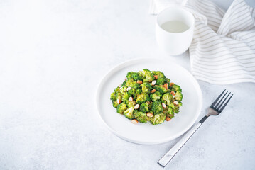 Roasted Broccoli with almond slices in a plate