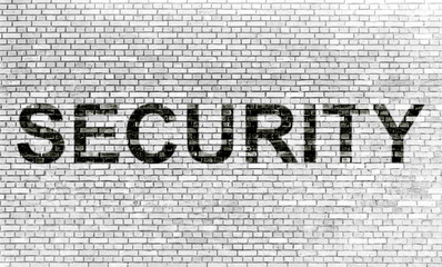 SECURITY on grunge brick wall background