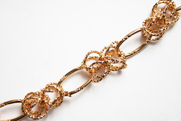 Gold jewelry chain necklace isolated on white