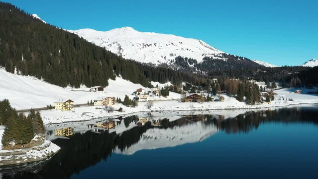 2022 - Excellent aerial view of a lake front in Davos, Switzerland.