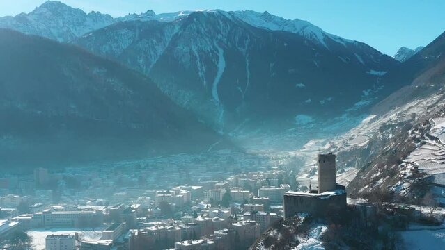2022 - Excellent aerial view of Martigny, Switzerland, nestled in the mountains.