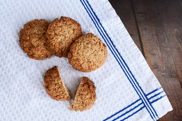 oatmeal cookies with nuts on a rustic background. view from above