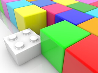White toy brick as a connection between colored toy cubes