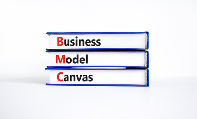 BMC business model canvas symbol. Concept words BMC business model canvas on books on a beautiful...