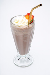 Chocolate milkshake with strawberries on white background
