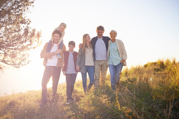 It was the perfect day for a family outing. Full length portrait of a happy multi-generational family on an afternoon walk.