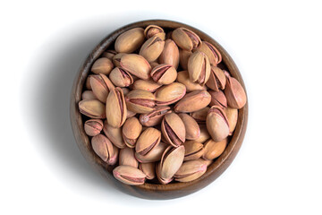 Close-up roasted pistachios in a bamboo bowl. Nuts from Gaziantep-Turkey region