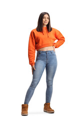 Full length portrait of a casual young female in a sweathsirt and jeans