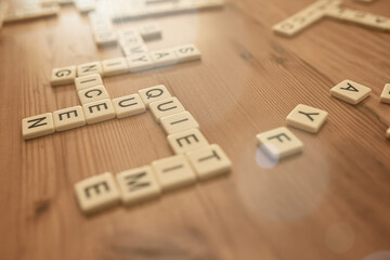 Working words together. Shot of a board game being played without the board.