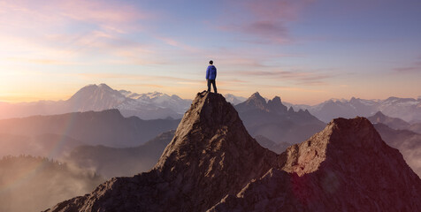 Adventurous Man Hiker Standing on top of a rocky mountain overlooking the dramatic landscape at sunset. 3d rendering peak. Background image from British Columbia, Canada. Adventure Concept Artwork