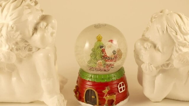 ball with snowflakes, christmas toy, angel statues