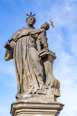 Fototapeta na wymiar Statue of Anthony of Padua on Charles Bridge in Prague
