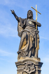 Statue of John the Baptist on Charles Bridge in Prague