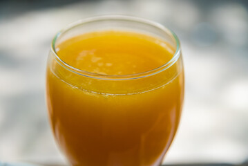 glass with freshly squeezed orange juice