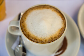 coffee with sparkling milk on a plate